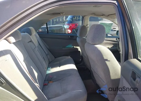 2003 Toyota Camry Le from USA, damaged, VIN 4T1BE32K33U741780